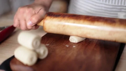 Hands rolls it with a rolling pin The process of cooking baking. Stock Footage 135888102