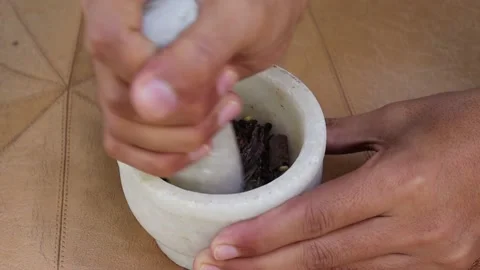 Hands Rubbed The  spices in a Mortar Stock Footage