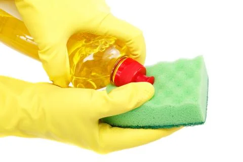 Hands in rubber gloves with a bottle of detergent and sponge on a white backg Foto stock