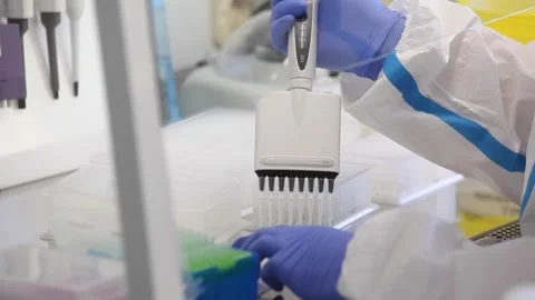 Hands in rubber gloves. hands of a laboratory assistant. test tubes, Stock-Footage 141893555