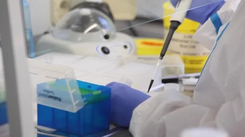 Hands in rubber gloves. hands of a laboratory assistant. test tubes, Stock Footage 141893588