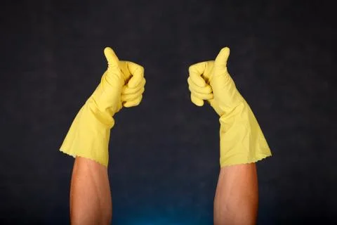 Hands in Rubber Gloves Stock Photos