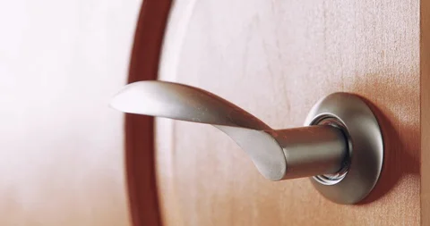 Hands sanitizing door handle Stock Footage 130129411