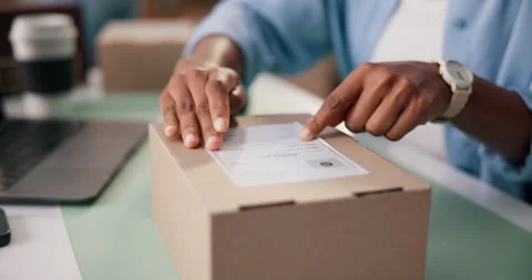 Hands, scanner and label for box at warehouse with ecommerce, inventory Stock Footage 318638354