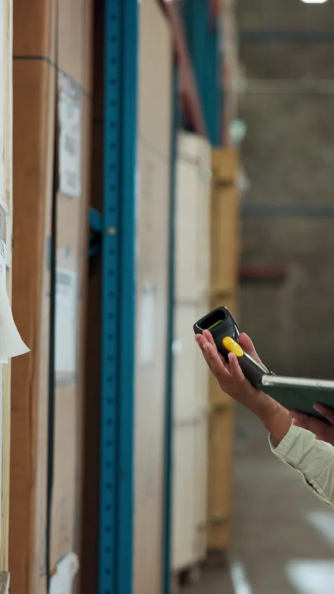 Hands, scanner and tablet with box in warehouse for logistics, price check or Stock Footage 340540971