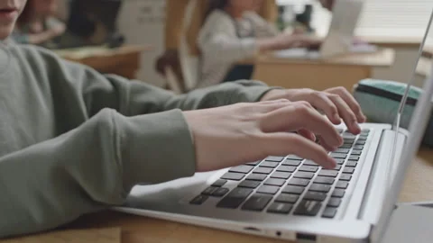 Hands of Schoolboy Typing on Laptop during Programming Class Stock Footage 245457034