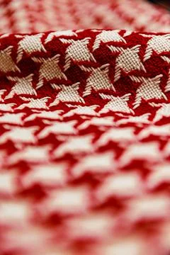 Hands with scissors on the fabric Stock Photos