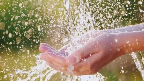 Hands scoop up clear water from stream to drink or wash. purity Small river Stock Footage 270409498