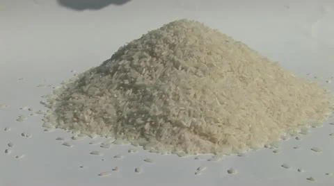 Hands scooping rice Stock Footage 11706715
