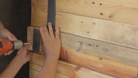 Hands Screwing the Handle to a Door Stock Footage 89772544