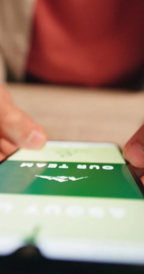 Hands, scroll and website in office with phone screen, about us and site testing Stock Footage 327784609