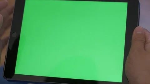 Hands Scrolling on Green Screen Stock Footage 116843441
