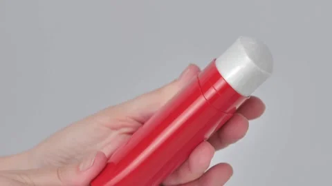 Hands scrolling solid deodorant antiperspirant. Close up Stock Footage 206520103