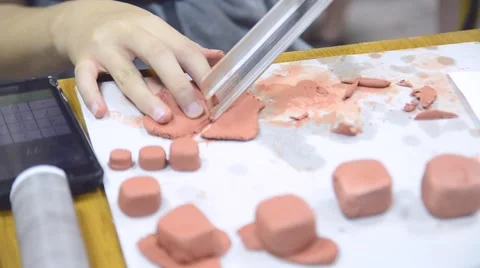 Hands sculpting with clay Stockbeeldmateriaal 60986354