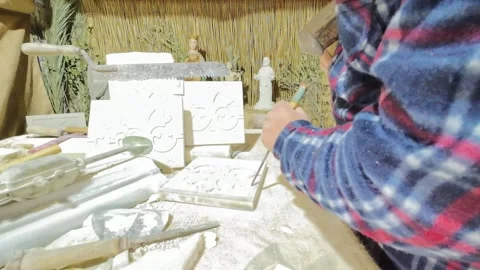 Hands of a sculptor working the marble Video stock 297586912