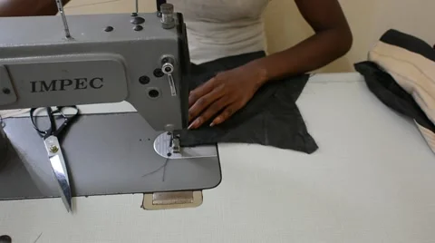 Hands of a seamstress African Stock Footage 40705398