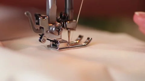Hands of seamstress working on sewing machine. Stock Footage 204741536