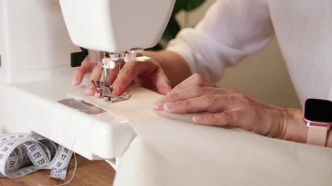 Hands of seamstress working on sewing machine. Stock Footage 204741539