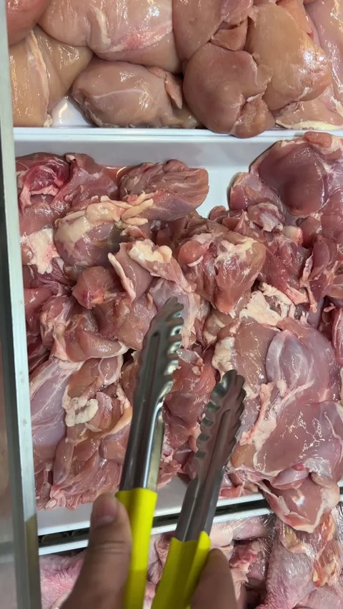 Hands selecting chicken meat in the supermarket Stock Footage 327216183