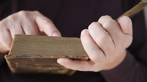 Hands of senior man reading book Stock Footage 39411995