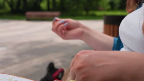 Hands Separating Green Thread in Park Close Up Stock Footage 326032037