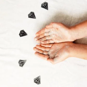 Hands in sequins. around there are diamonds. view from above 스톡 사진