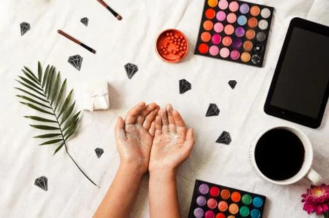 Hands in sequins. hot coffee. makeup. fashion and beauty. Fotos Stock