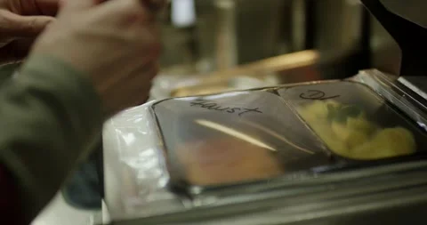 Hands Serving Portions From Covered Trays, Canteen Buffet Counter, Close Up Shot Stock-Footage 340364769
