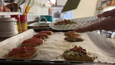 Hands serving Valencian coca with spatula onto plate Stock Footage 342822171
