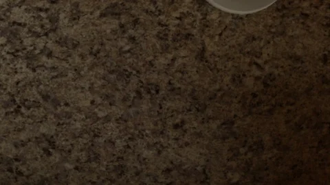 Hands setting coffee with art on a table Stock Footage 90599122