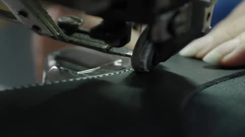 Hands Sewing Leather Shoe Material on Industrial Machine in Factory Close Up Stock Footage 341669005