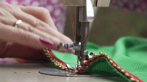 Hands of a sewing machine Stock Footage 166646251