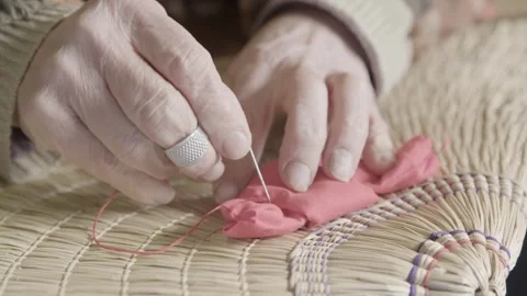 Hands Sewing Red Cloth for Bon Odori Hat Making in Ugo Town, Akita, Japan Stock Footage 340319519