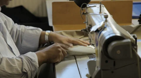 Hands sewing with a sewing machine Stock Footage 31341192