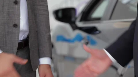 Hands shaking in front of the car Stock Footage 252681389