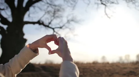 Hands in the shape of a heart of love Stock-Footage 62917402