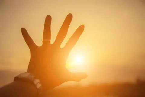 Hands-shape for the Sun. Stock Photos