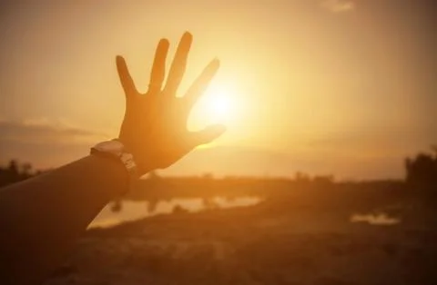 Hands-shape for the Sun. Stock Photos