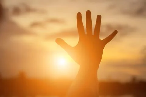 Hands-shape for the Sun. Stock Photos