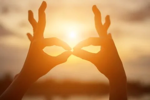 Hands-shape for the Sun. Stock-Fotos