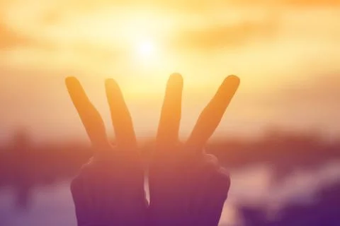 Hands-shape for the Sun. Stock Photos
