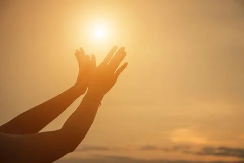 Hands-shape for the Sun. Stock Photos