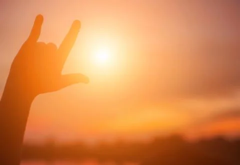 Hands-shape for the Sun. Stock Photos