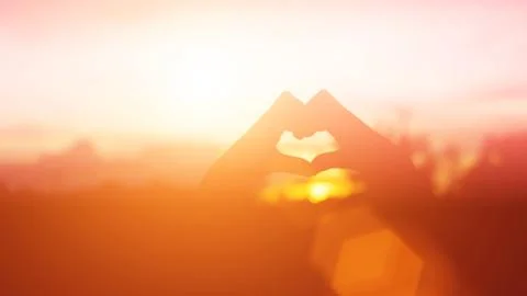 Hands-shape for the Sun. Stock Photos