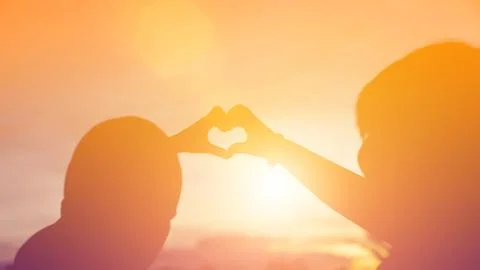 Hands-shape for the Sun. Stock Photos