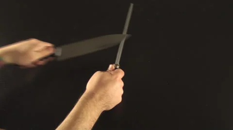Hands Sharpening Knife Above-Shot Stock Footage 34975745