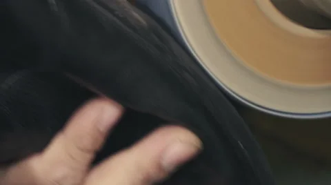 Hands of the shoemaker working on the sole Stock Footage 61774704