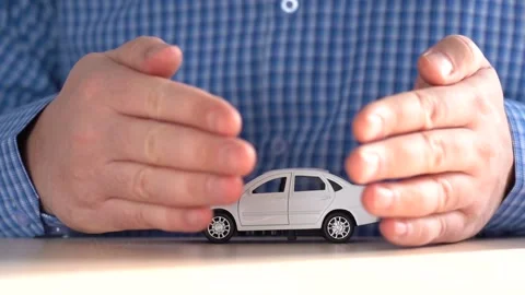 Hands Show Toy Car. The concept of buying or safety of a new car Vídeo Stock 150804924