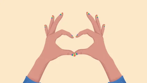 Hands showing heart shape with rainbow nails on beige background Stock Footage 306294289
