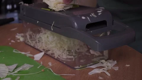 Hands shred cabbage. Cooking. Stock Footage 285475116